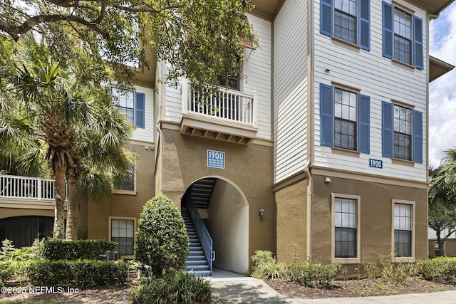 12700 Bartram Park Blvd Unit 1923, Jacksonville, FL 32258 - view of front of home featuring stucco siding and stairway
