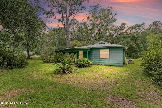 44125 Jarrett Rd, Callahan, FL 32011 - yard at dusk with a lawn