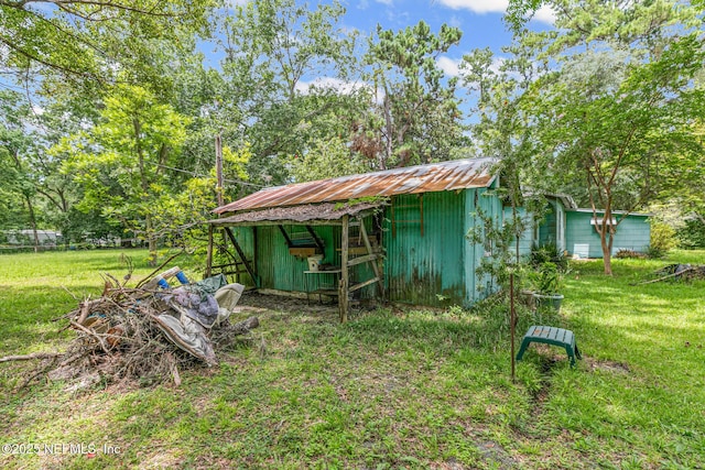 44125 Jarrett Rd, Callahan, FL 32011 - view of green lawn featuring an outbuilding
