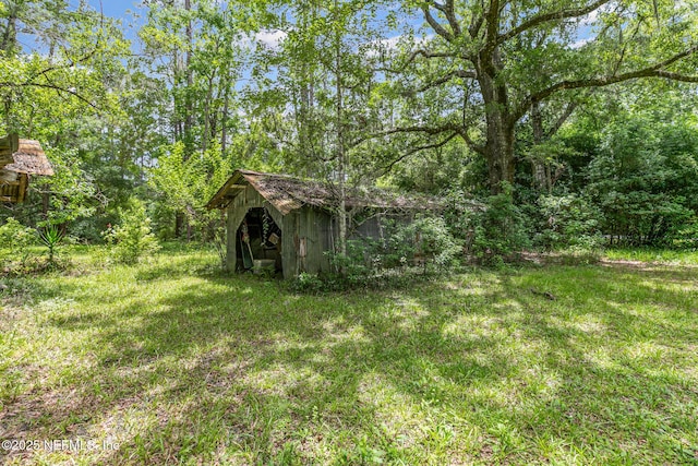 44125 Jarrett Rd, Callahan, FL 32011 - view of yard featuring a storage shed