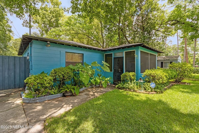 3207 Plum St, Jacksonville, FL 32205 - view of front of home with a sunroom