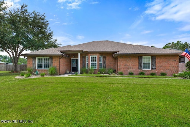 44677 Green Meadows Ln, Callahan, FL 32011 - ranch-style house featuring brick siding