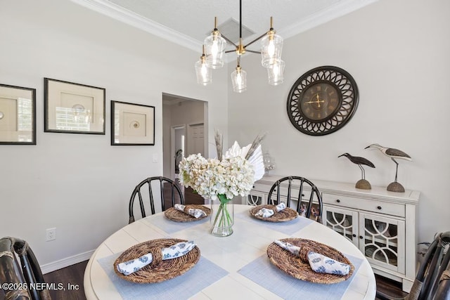 44677 Green Meadows Ln, Callahan, FL 32011 - dining room with crown molding and wood finished floors