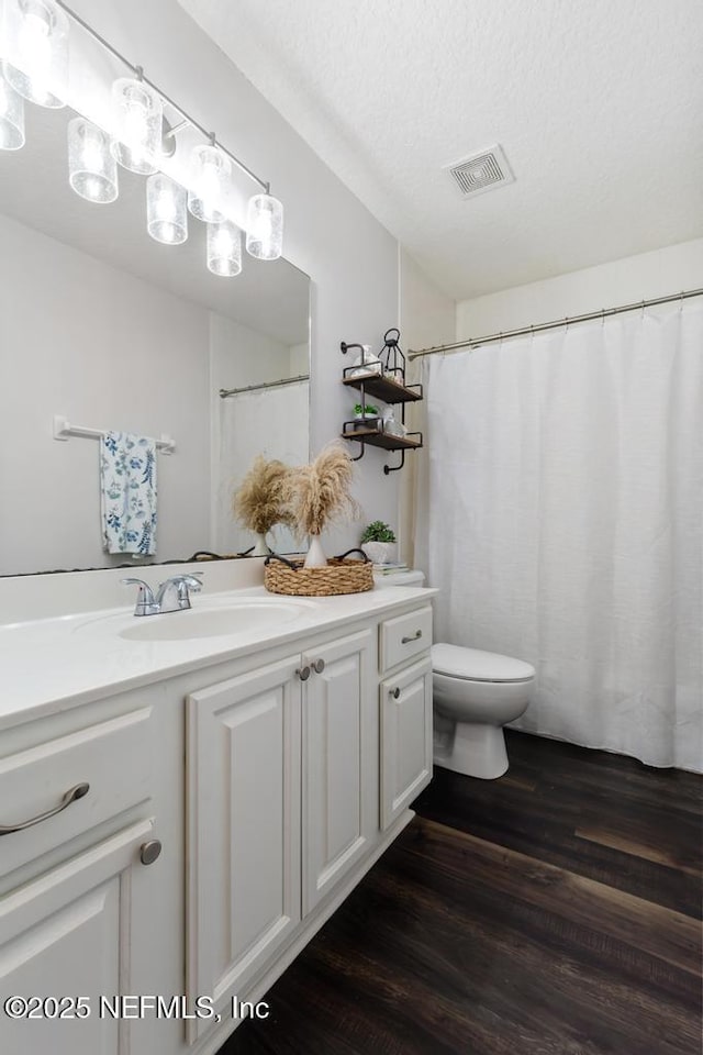 44677 Green Meadows Ln, Callahan, FL 32011 - bathroom featuring vanity and wood finished floors