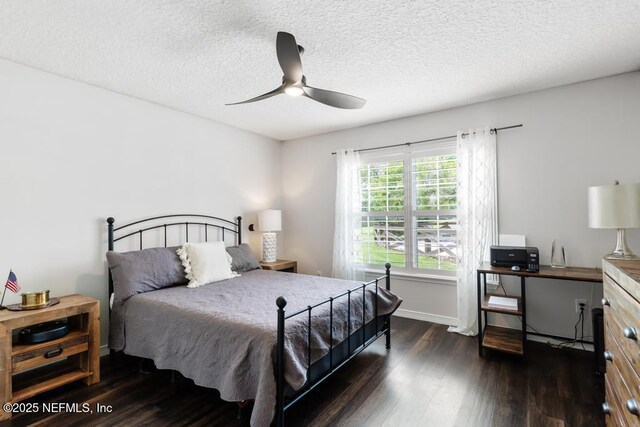 44677 Green Meadows Ln, Callahan, FL 32011 - bedroom featuring wood finished floors, a textured ceiling, and a ceiling fan