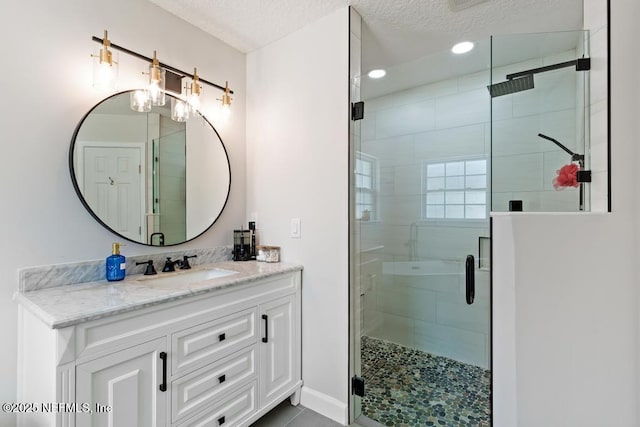 44677 Green Meadows Ln, Callahan, FL 32011 - bathroom with vanity, a shower stall, a textured ceiling, recessed lighting, and tile patterned flooring