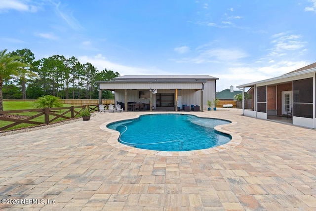 44677 Green Meadows Ln, Callahan, FL 32011 - view of swimming pool with a sunroom and a patio