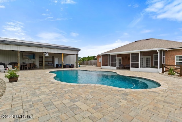 44677 Green Meadows Ln, Callahan, FL 32011 - view of swimming pool with a sunroom and a patio