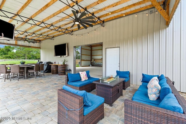 44677 Green Meadows Ln, Callahan, FL 32011 - view of patio / terrace featuring an outdoor living space with a fire pit, ceiling fan, outdoor dining space, and a bar
