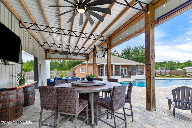 44677 Green Meadows Ln, Callahan, FL 32011 - fenced backyard with an outdoor structure, a patio, a storage structure, and outdoor dining area