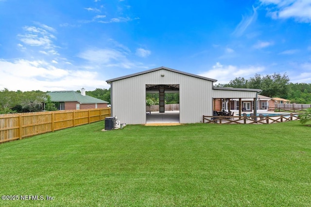 44677 Green Meadows Ln, Callahan, FL 32011 - back of house with a fenced backyard and a patio