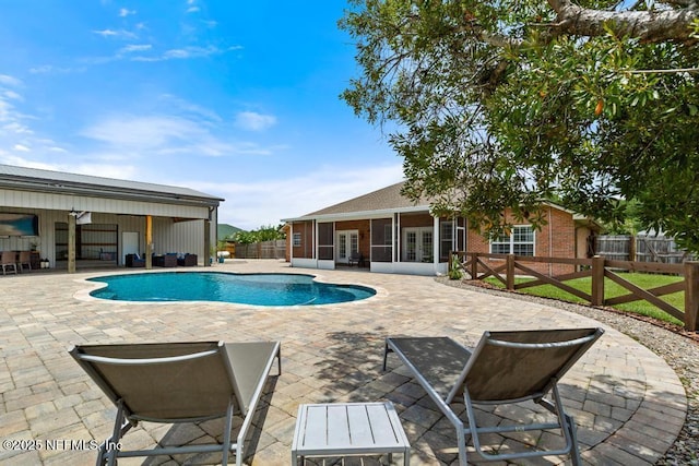 44677 Green Meadows Ln, Callahan, FL 32011 - view of pool with french doors, a sunroom, and a patio area