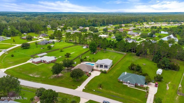 44677 Green Meadows Ln, Callahan, FL 32011 - aerial view of residential area with a forest
