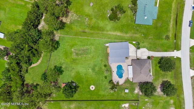 44677 Green Meadows Ln, Callahan, FL 32011 - drone / aerial view of a pool