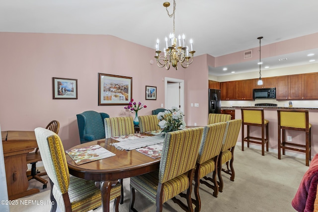 945 Registry Blvd Unit 312, Saint Augustine, FL 32092 - dining area with a chandelier, lofted ceiling, light colored carpet, and recessed lighting