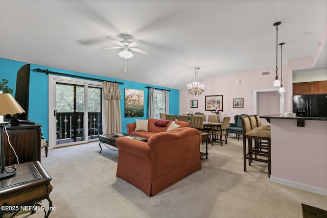 945 Registry Blvd Unit 312, Saint Augustine, FL 32092 - living area featuring light carpet, ceiling fan, a chandelier, and lofted ceiling