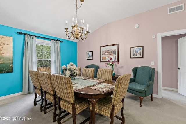 945 Registry Blvd Unit 312, Saint Augustine, FL 32092 - dining room with light carpet, vaulted ceiling, and a chandelier