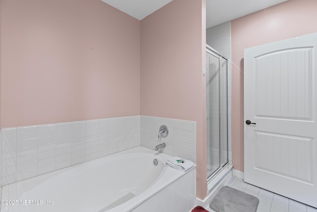 945 Registry Blvd Unit 312, Saint Augustine, FL 32092 - full bath with a garden tub, a stall shower, and tile patterned floors