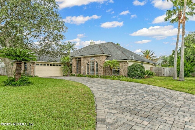 508 Lighthouse Ct, Neptune Beach, FL 32266 - french country inspired facade featuring decorative driveway, a garage, brick siding, and a chimney