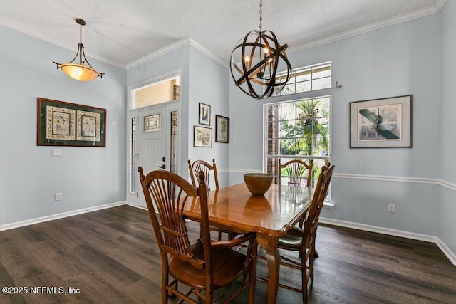 508 Lighthouse Ct, Neptune Beach, FL 32266 - dining space with dark wood-style flooring, a chandelier, ornamental molding, and a textured ceiling
