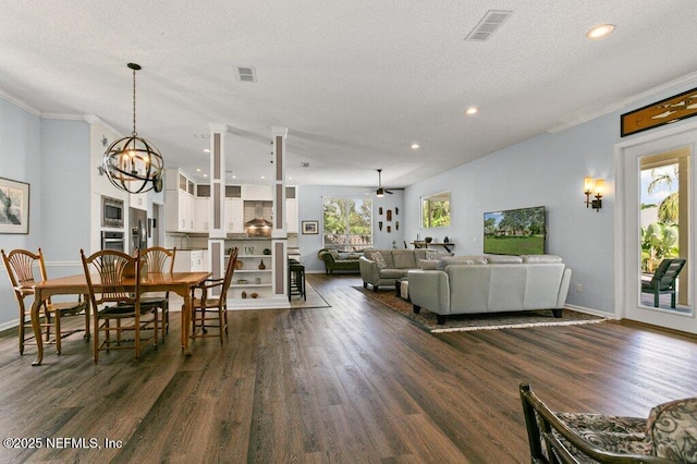 508 Lighthouse Ct, Neptune Beach, FL 32266 - dining room with dark wood-style flooring, recessed lighting, a chandelier, a textured ceiling, and ceiling fan