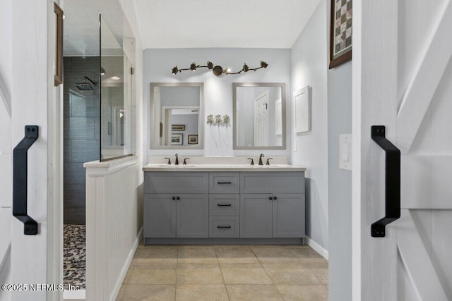 508 Lighthouse Ct, Neptune Beach, FL 32266 - full bathroom featuring double vanity, a walk in shower, and tile patterned floors