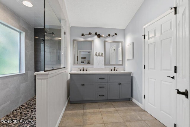 508 Lighthouse Ct, Neptune Beach, FL 32266 - full bathroom with double vanity and a walk in shower