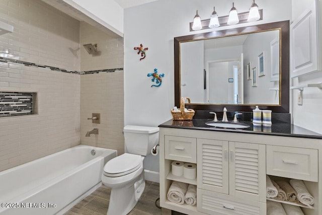 508 Lighthouse Ct, Neptune Beach, FL 32266 - full bathroom featuring vanity, shower / bathtub combination, and wood finished floors