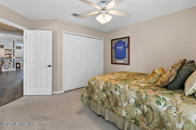 508 Lighthouse Ct, Neptune Beach, FL 32266 - bedroom featuring a closet, carpet floors, and ceiling fan