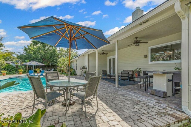 508 Lighthouse Ct, Neptune Beach, FL 32266 - view of patio with ceiling fan, outdoor dining area, and french doors