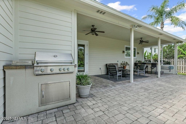508 Lighthouse Ct, Neptune Beach, FL 32266 - view of patio with ceiling fan, area for grilling, and an outdoor living space