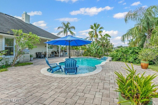 508 Lighthouse Ct, Neptune Beach, FL 32266 - view of swimming pool with a patio and a jacuzzi