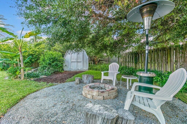 508 Lighthouse Ct, Neptune Beach, FL 32266 - view of patio / terrace with a shed and an outdoor fire pit