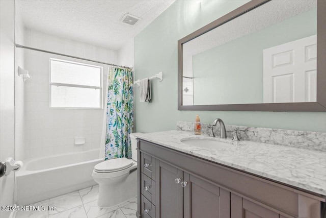 2484 Royal Pointe Dr, Green Cove Springs, FL 32043 - bathroom with vanity, shower / bath combo, a textured ceiling, and marble look tiles