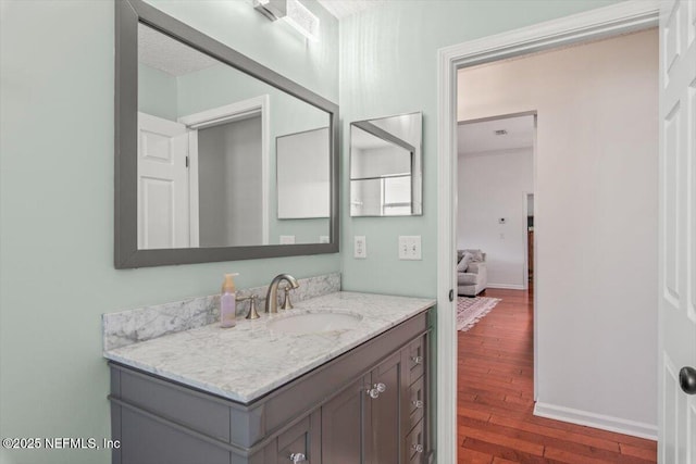 2484 Royal Pointe Dr, Green Cove Springs, FL 32043 - bathroom with vanity and wood finished floors