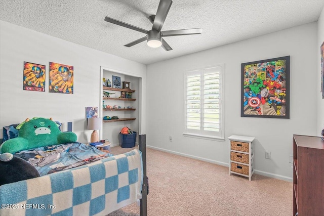 2484 Royal Pointe Dr, Green Cove Springs, FL 32043 - carpeted bedroom featuring a textured ceiling and a ceiling fan
