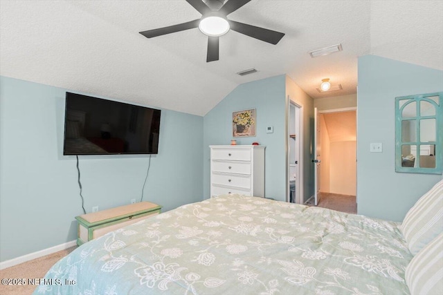 2484 Royal Pointe Dr, Green Cove Springs, FL 32043 - carpeted bedroom with vaulted ceiling, ceiling fan, and a textured ceiling