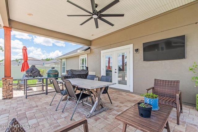 2484 Royal Pointe Dr, Green Cove Springs, FL 32043 - view of patio featuring french doors, outdoor dining space, and a ceiling fan