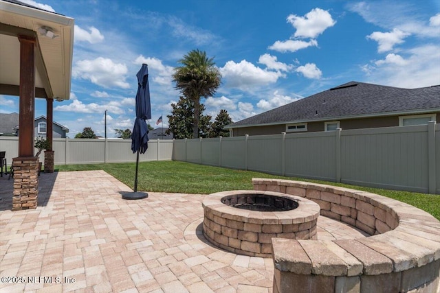 2484 Royal Pointe Dr, Green Cove Springs, FL 32043 - fenced backyard with a fire pit and a patio area