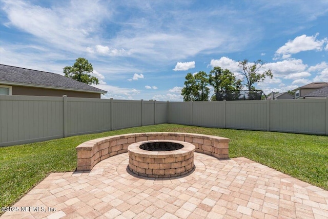 2484 Royal Pointe Dr, Green Cove Springs, FL 32043 - fenced backyard featuring an outdoor fire pit and a patio