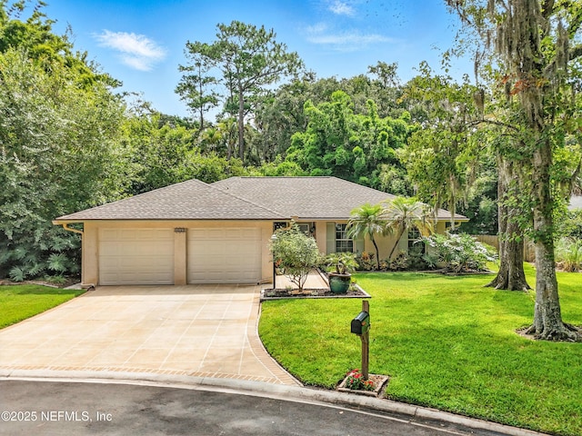 603 Miramar Ct, Ponte Vedra Beach, FL 32082 - ranch-style house with driveway, a garage, a front yard, and stucco siding