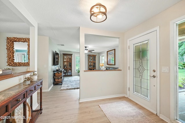 603 Miramar Ct, Ponte Vedra Beach, FL 32082 - entrance foyer featuring light wood-type flooring, plenty of natural light, and ceiling fan
