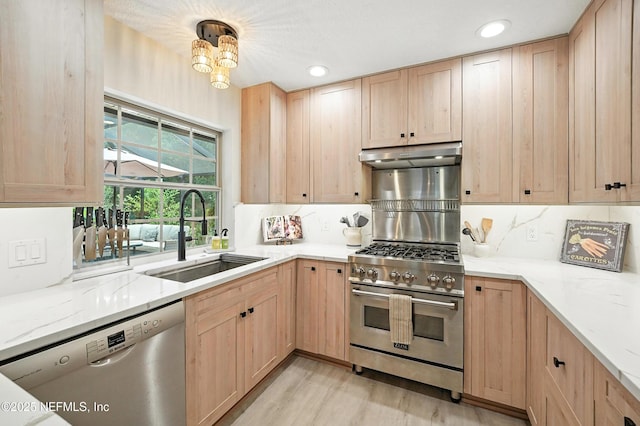 603 Miramar Ct, Ponte Vedra Beach, FL 32082 - kitchen featuring light brown cabinets, stainless steel appliances, under cabinet range hood, light stone counters, and light wood-style flooring
