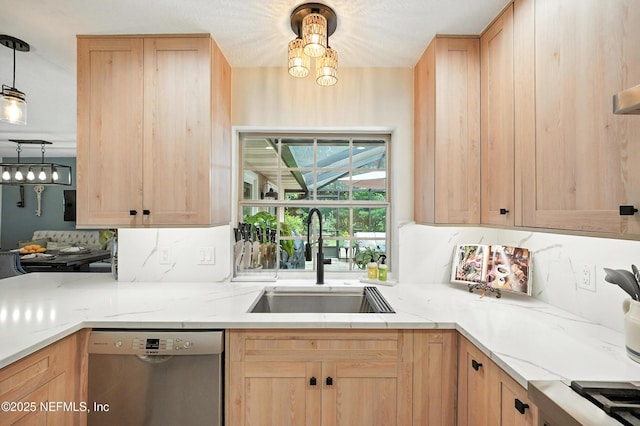 603 Miramar Ct, Ponte Vedra Beach, FL 32082 - kitchen with stainless steel dishwasher, light brown cabinets, decorative backsplash, a chandelier, and light stone counters