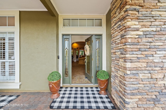 2269 Cascadia Ct, Saint Augustine, FL 32092 - doorway to property featuring stucco siding