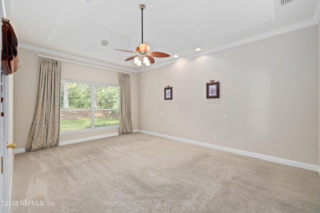 2269 Cascadia Ct, Saint Augustine, FL 32092 - spare room with ornamental molding, light carpet, a ceiling fan, recessed lighting, and a raised ceiling