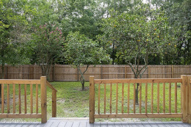 8305 Coralberry Ln, Jacksonville, FL 32244 - fenced backyard with a wooden deck