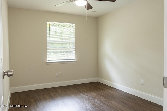 8305 Coralberry Ln, Jacksonville, FL 32244 - unfurnished room featuring a ceiling fan and dark wood-type flooring