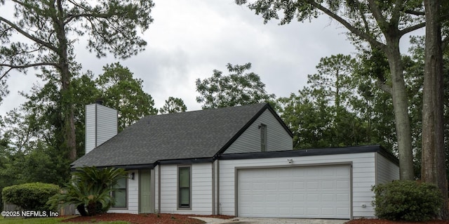8305 Coralberry Ln, Jacksonville, FL 32244 - view of front of house with a garage, concrete driveway, a chimney, and a shingled roof