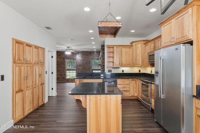 2871 Anchor Rd, Middleburg, FL 32068 - kitchen featuring stainless steel appliances, light brown cabinetry, dark wood-type flooring, a breakfast bar area, and open shelves